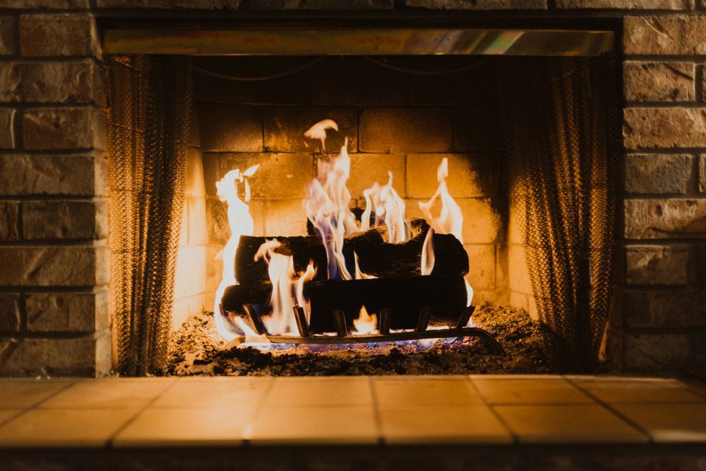 big fireplace with wood burning