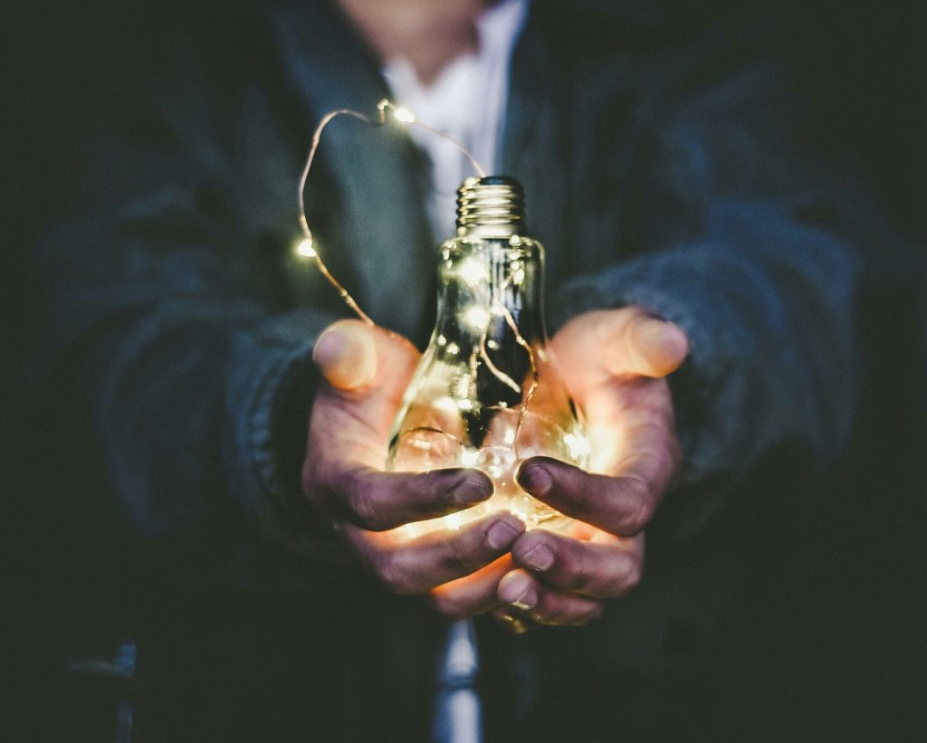 led lightbub held in hands